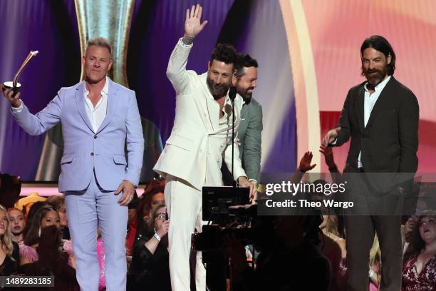 Trevor Rosen, Matthew Ramsey, Brad Tursi and Geoff Sprung of Old Dominion accept the Group of the Year award onstage during the 58th Academy Of...