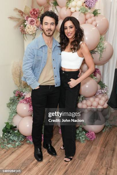 Kevin Jonas and Danielle Jonas attend Shop.Sip.Meet With Danielle Jonas at Sora Boutique on May 11, 2023 in New York City.