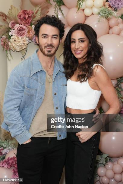 Kevin Jonas and Danielle Jonas attend Shop.Sip.Meet With Danielle Jonas at Sora Boutique on May 11, 2023 in New York City.