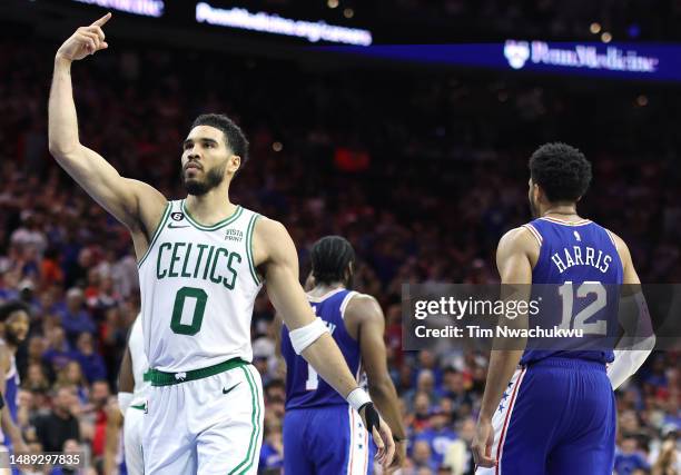 Jayson Tatum of the Boston Celtics celebrates a basket against the Philadelphia 76ers during the fourth quarter in game six of the Eastern Conference...