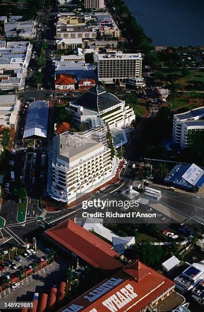 an aerial shot of the trinity wharf and casino precinct in cairns. - cairns road stock pictures, royalty-free photos & images