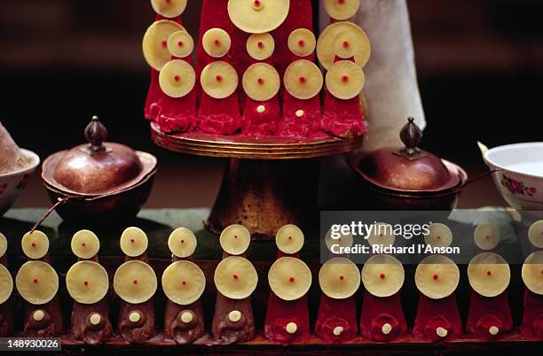 offerings on an altar at the mani rimdu festival at chiwang gompa (monastery). - mani rimdu festival bildbanksfoton och bilder