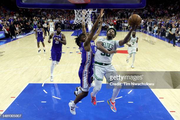 Marcus Smart of the Boston Celtics shoots the ball against Tyrese Maxey of the Philadelphia 76ers during the first quarter in game six of the Eastern...