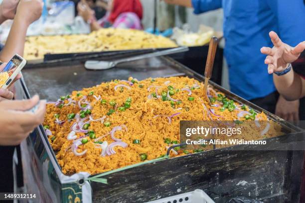 biryani rice - pilafrijst stockfoto's en -beelden