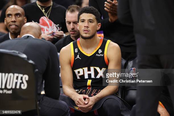 Devin Booker of the Phoenix Suns reacts during a timeout in the fourth quarter against the Denver Nuggets in game six of the Western Conference...