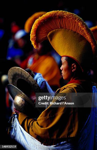 monk playing cymbals at mani rimdu festival. - mani rimdu festival bildbanksfoton och bilder