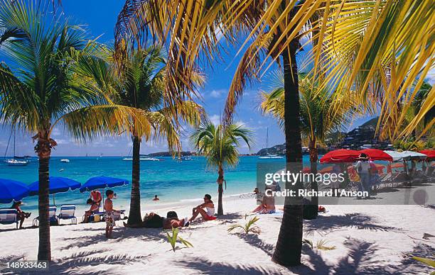 philipsburg beach on great bay. - peeple of caribbean stock-fotos und bilder