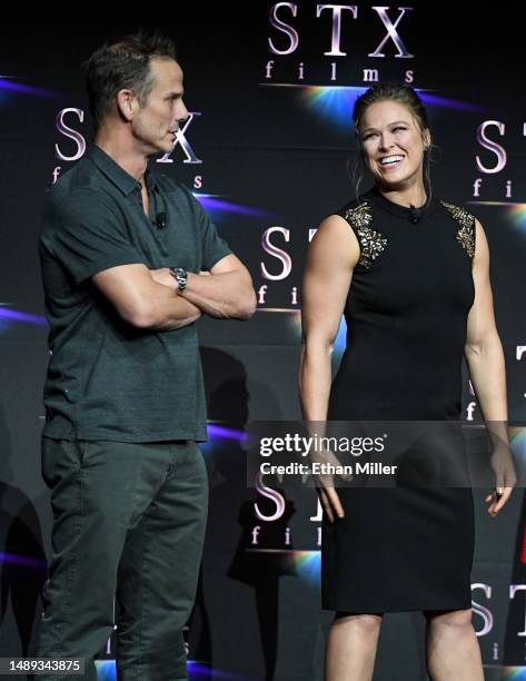 Peter Berg and Ronda Rousey promote the upcoming film "Mile 22" during the STXfilms presentation during CinemaCon, the official convention of the...