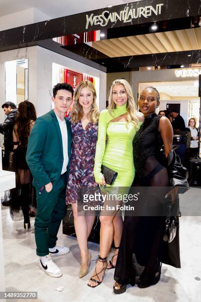 German actor Marc Weinmann, German actress Nina Ensmann, model Annika Gassner and model Noella Mbomba attend the opening of the YSL Beauty Counter at...