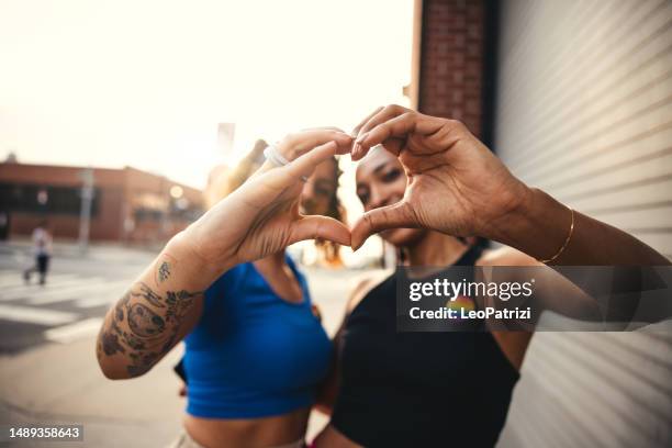 friends take a selfie - heart shape stock pictures, royalty-free photos & images