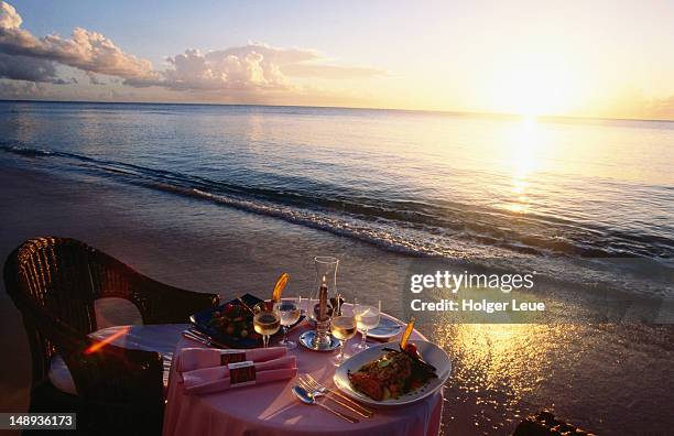 lobster, red snapper dinner on beach, the restaurant at sandy lane. - fish barbados stock pictures, royalty-free photos & images