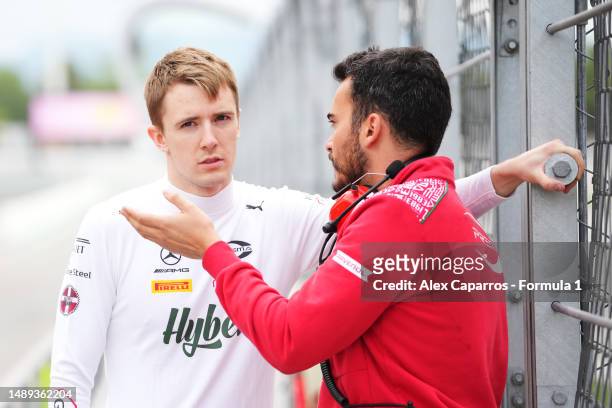 Frederik Vesti of Denmark and PREMA Racing talks with a PREMA Racing team member in the Pitlane during day three of Formula 2 Testing at Circuit de...