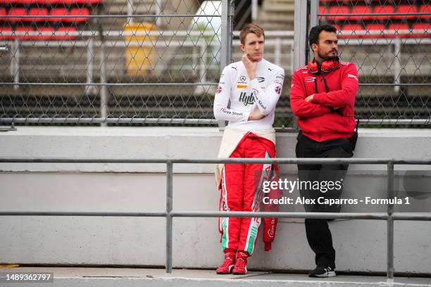 Frederik Vesti of Denmark and PREMA Racing talks with a PREMA Racing team member in the Pitlane during day three of Formula 2 Testing at Circuit de...