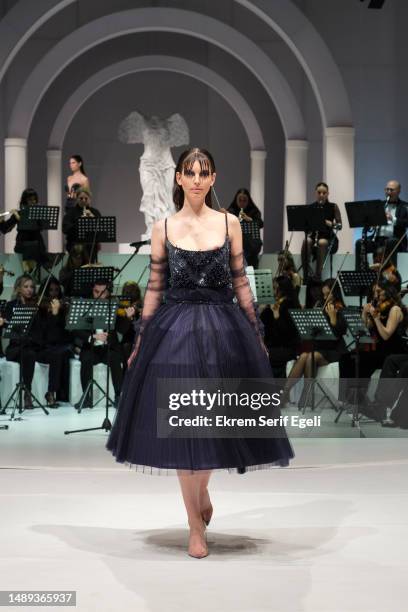 Model walks at the runway Cihan Nacar 10th Year Collection 2023 Fashion Show at JW Marriott Hotel Istanbul Marmara Sea on May 10, 2023 in Istanbul,...