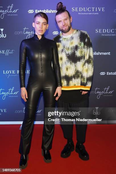 Alina Süggeler and Andreas Weizel of Frida Gold attend the .comTogether Girlbosses event by .comTessa on at La Plage Parisienne May 11, 2023 in...