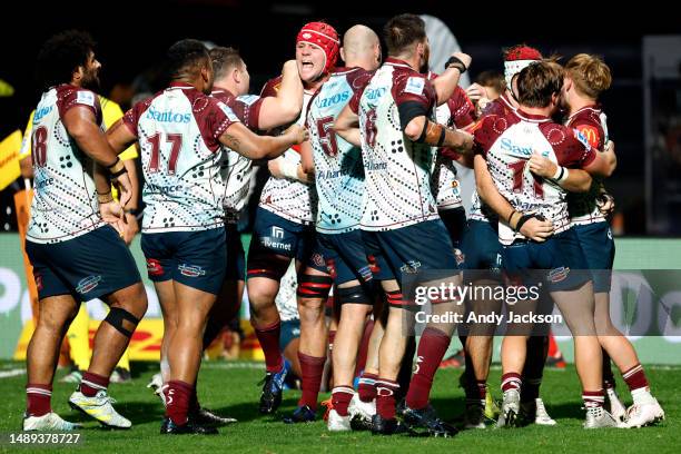 The Reds celebrate after winning the round 12 Super Rugby Pacific match between Chiefs and Queensland Reds at Yarrow Stadium, on May 12 in New...