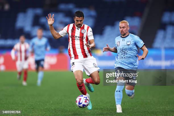 Nuno Reis of Melbourne City is challenged by Robert Mak of Sydney FC during the first leg of the A-League Men's Semi Final between Sydney FC and...