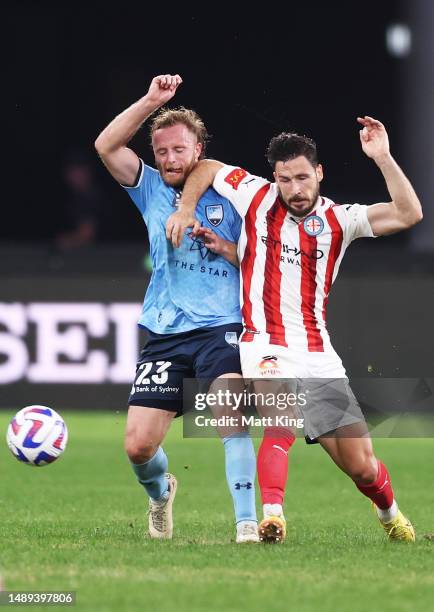 Rhyan Grant of Sydney FC is challenged by Mathew Leckie of Melbourne City during the first leg of the A-League Men's Semi Final between Sydney FC and...