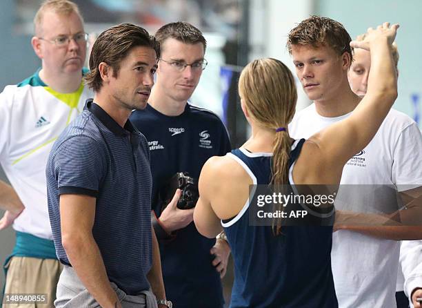 Australian footballer Harry Kewell meets members of the Australian Olympic swimming squad during a training session ahead of the London 2012 Olympic...