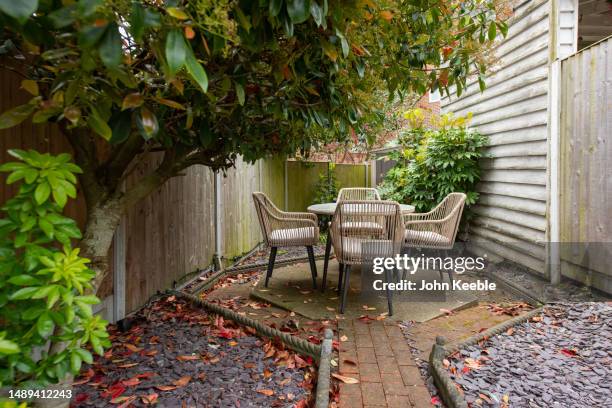 property cottage garden exteriors - courtyard stock pictures, royalty-free photos & images