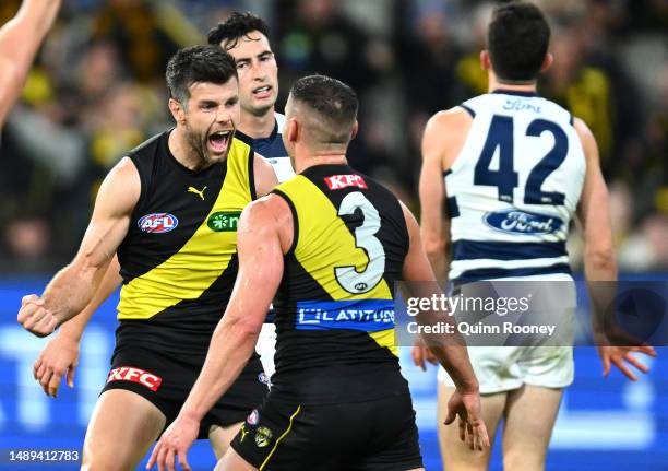 Trent Cotchin of the Tigers celebrates kicking a goal during the round nine AFL match between Richmond Tigers and Geelong Cats at Melbourne Cricket...