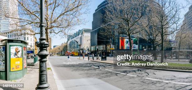 sunny day on kurfürstendamm in berlin's mitte district. - first sunny spring day in berlin stock pictures, royalty-free photos & images