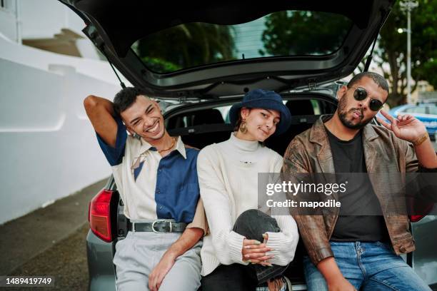 portrait of friends with a cool attitude making faces and posing looking at camera - nonbinary stock pictures, royalty-free photos & images