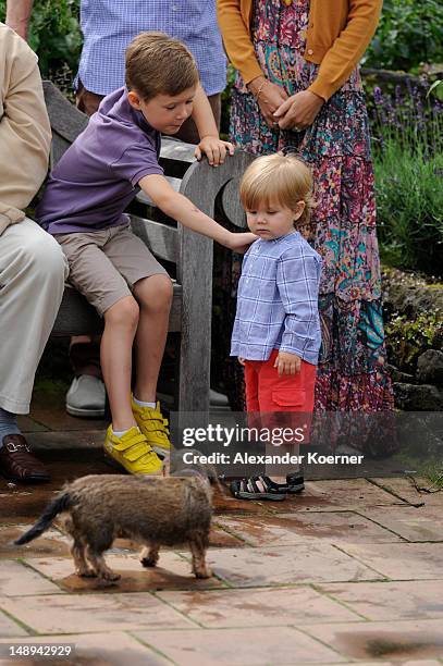 Prince Christian of Denmark and Prince Vincent Frederik Minik Alexander of Denmark pose during a photocall for the Royal Danish family at their...