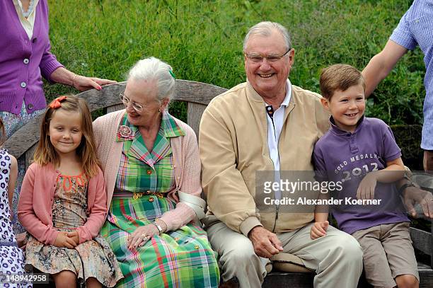 Princess Isabella, Queen Margrethe II, Prince Consort Henrik of Denmark and Prince Christian pose during a photocall for the Royal Danish family at...