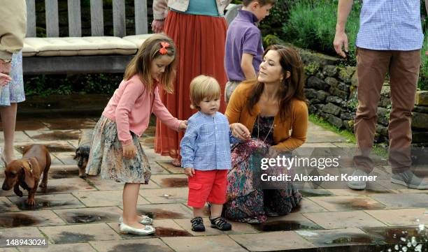 Princess Isabella, Prince Vincent Frederik Minik Alexander of Denmark and Princess Mary of Denmark pose during a photocall for the Royal Danish...