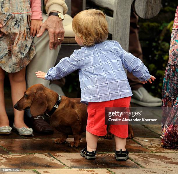 Prince Vincent Frederik Minik Alexander of Denmark poses during a photocall for the Royal Danish family at their summer residence of Grasten Slot on...
