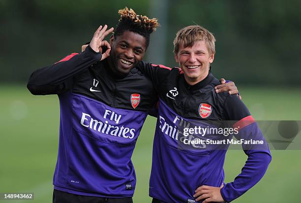 Alex Song and Andrey Arshavin of Arsenal during a training session at London Colney on July 20, 2012 in St Albans, England.
