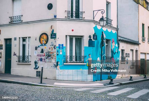 Butte aux Cailles artists' quarter with its ornate house paintings and other art techniques on April 27, 2023 in Paris, France. Famous for its iconic...