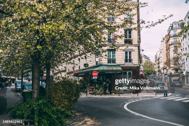 Streets look like small village streets seen on April 27, 2023 in Paris, France. Famous for its iconic landmarks, Paris is considered one of the most...