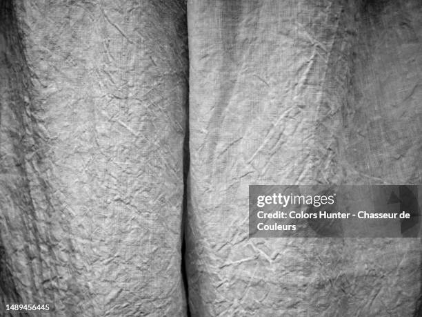 black and white photography of wrinkled cotton curtains with natural shadows in paris, france - newly industrialized country stock pictures, royalty-free photos & images