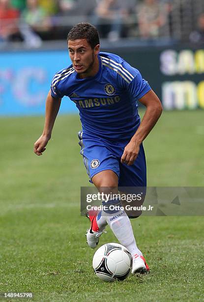 Eden Hazard of Chelsea FC dribbles against the Seattle Sounders FC at CenturyLink Field on July 18, 2012 in Seattle, Washington.