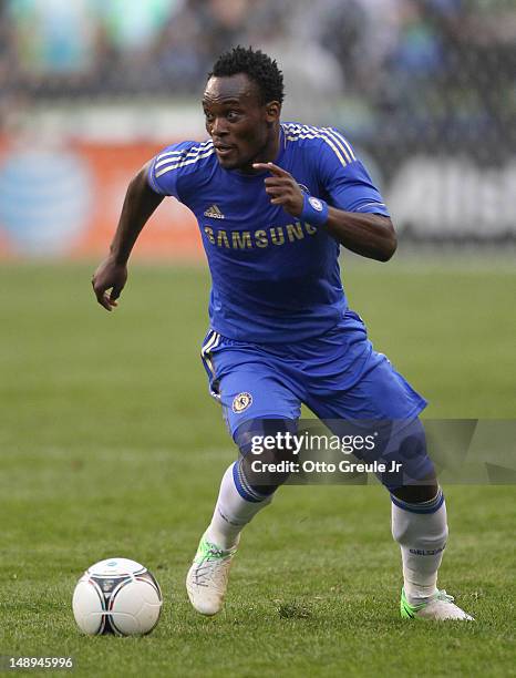 Michael Essien of Chelsea FC dribbles against the Seattle Sounders FC at CenturyLink Field on July 18, 2012 in Seattle, Washington.