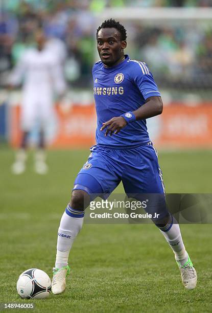 Michael Essien of Chelsea FC dribbles against the Seattle Sounders FC at CenturyLink Field on July 18, 2012 in Seattle, Washington.