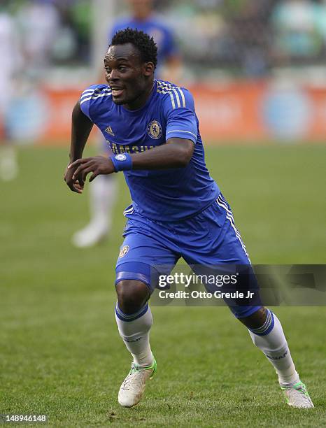 Michael Essien of Chelsea FC dribbles against the Seattle Sounders FC at CenturyLink Field on July 18, 2012 in Seattle, Washington.