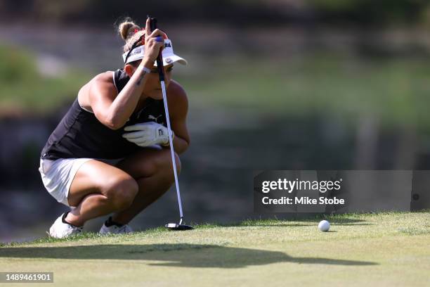 Lexi Thompson of the United States lines up a putt on the third green during the second round of the Cognizant Founders Cup at Upper Montclair...