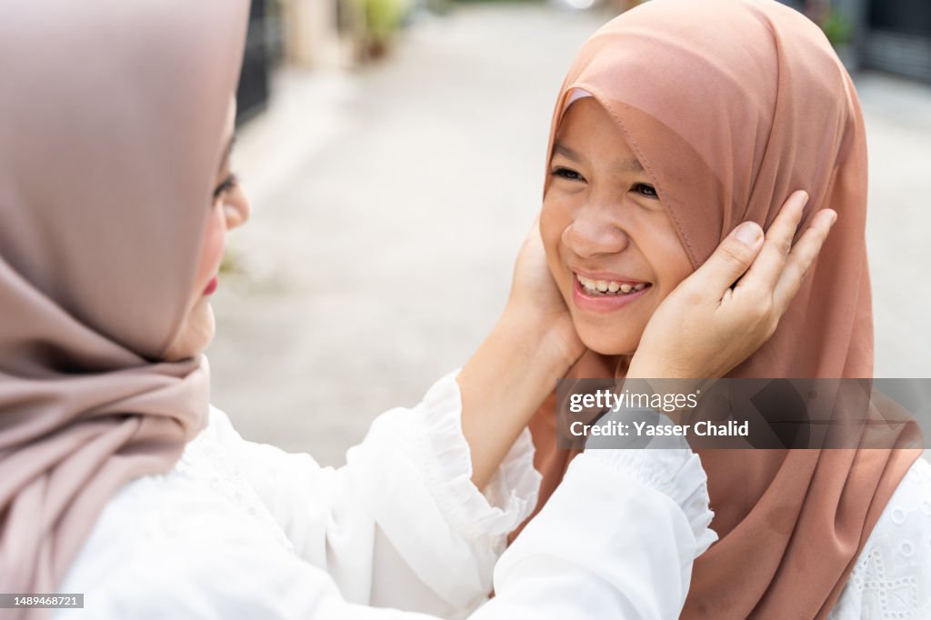 Mother Hold Her Daughter Head