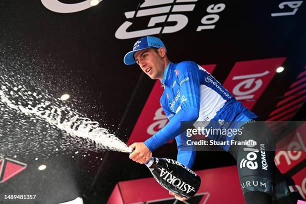 Davide Bais of Italy and Team EOLO-Kometa celebrates at podium as Blue Mountain Jersey winner during the 106th Giro d'Italia 2023, Stage 7 a 218km...