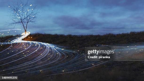 abstract wavy wires flowing in landscape - fibre optics stock pictures, royalty-free photos & images
