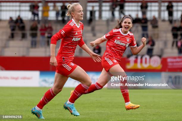 Lea Schüller of München celebrates scoring the opening goal during the FLYERALARM Frauen-Bundesliga match between FC Bayern Muenchen and TSG...
