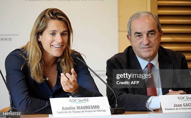 Former world number one Amelie Mauresmo gives a press conference next to the president of the French Tennis Federation , Jean Gachassin, on July 20,...