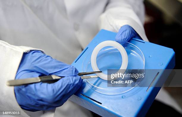 This picture taken on July 20, 2012 at Wits Reproductive Health and HIV Institute in Johannesburg shows a Dapivirine vaginal ring to be used in an...