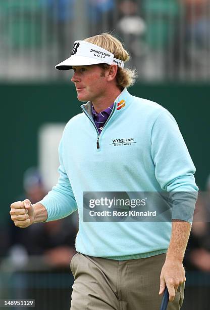 Brandt Snedeker of the United States celebrates a par-saving-putt on the 18th green en route to a six-under par 64 during the second round of the...