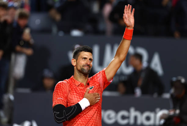 Novak Djokovic of Serbia celebrates his second victory against Tomas Martin Etcheverry of Argentina in the men's singles second round during day five...