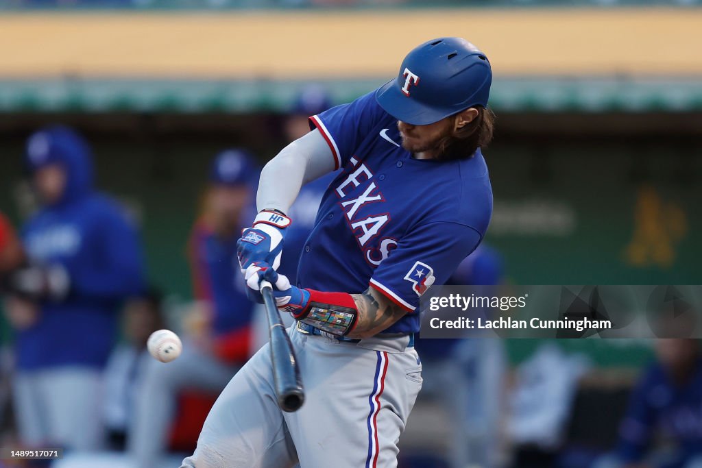 Texas Ranger Heim Jonah Heim of the Texas Rangers at bat against the Oakland Athletics ...