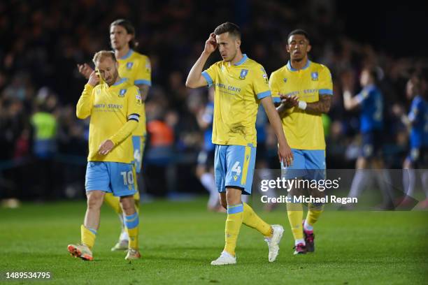 Will Vaulks of Sheffield Wednesday looks dejected with team mates after the Sky Bet League One Play-Off Semi-Final First Leg match between...